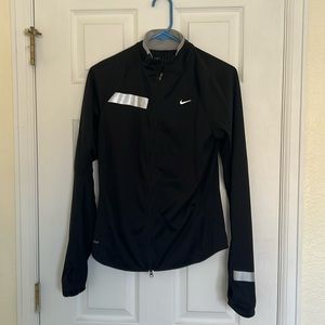 GOING TO GOODWILL APRIL 30– 
Black Nike running jacket